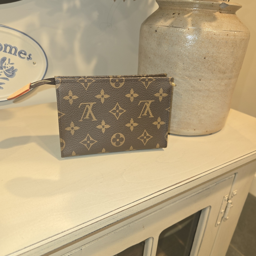 Louis Vuitton Dark Brown and Tan Monogram Pouch. Authenticated Through Entrupy.